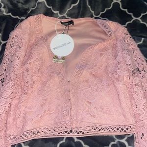 Women’s pink, lace, bell sleeve top, never worn, with tags.